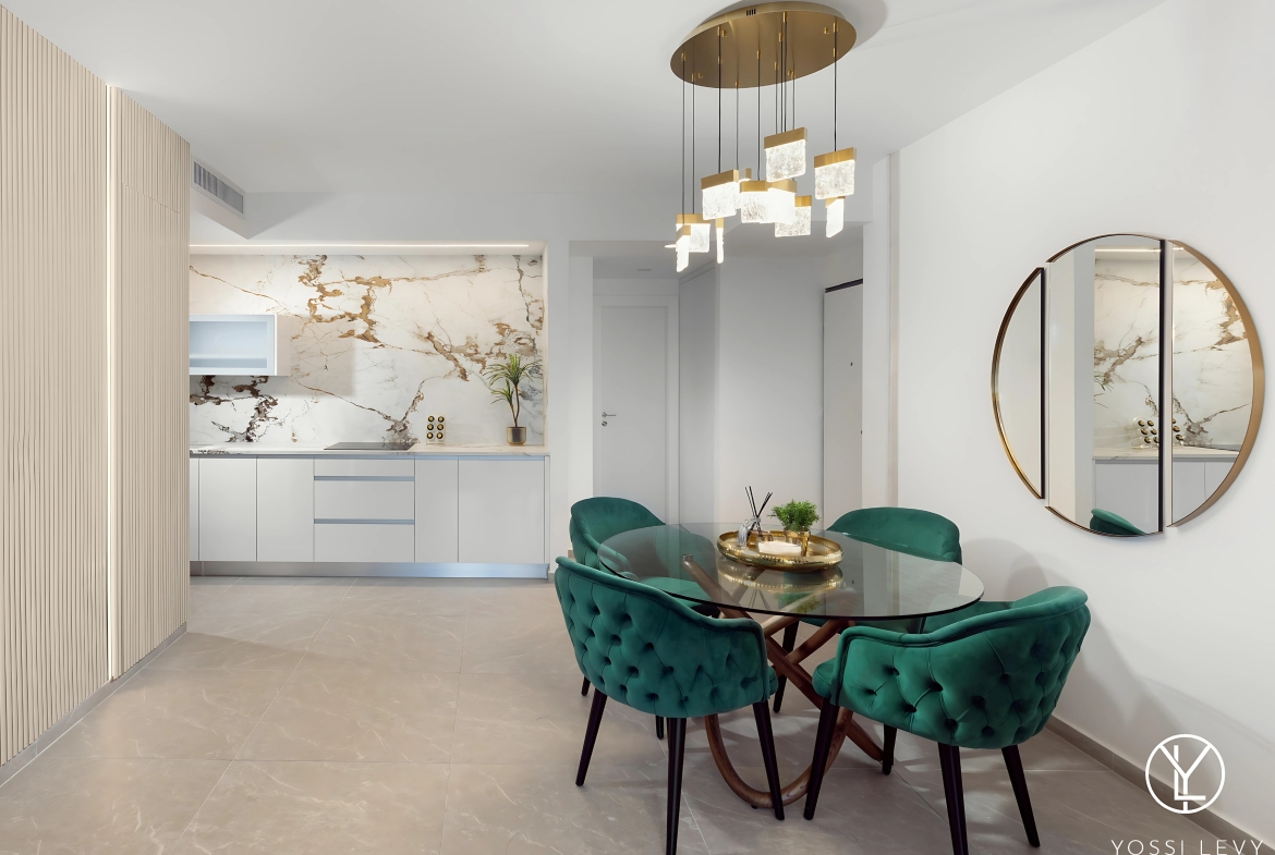 Sleek Open-Plan Kitchen And Dining Space in Savion View Tower